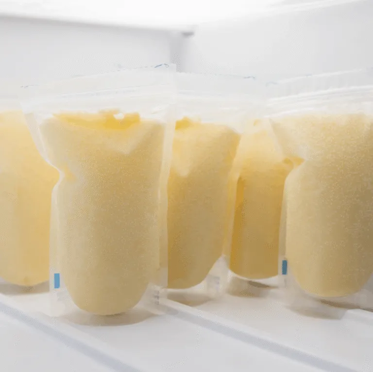 Bags and bottles of stored breast milk
